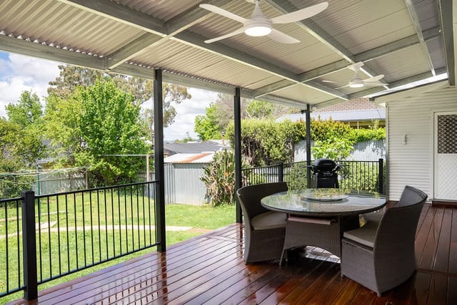 Covered deck with ceiling fans and lighting